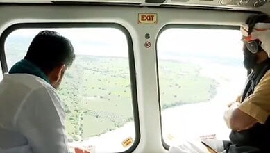 The image shows Telangana CM A Revanth Reddy conducting an aerial survey of flood-hit areas of Peddapalli, Kamareddy and Medak districts on Thursday, August 28, 2025.