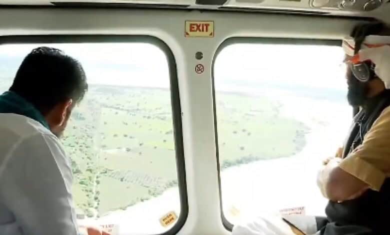 The image shows Telangana CM A Revanth Reddy conducting an aerial survey of flood-hit areas of Peddapalli, Kamareddy and Medak districts on Thursday, August 28, 2025.