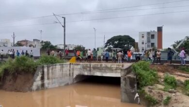 People stranded at the the railway under bridge in Mahabubnagar