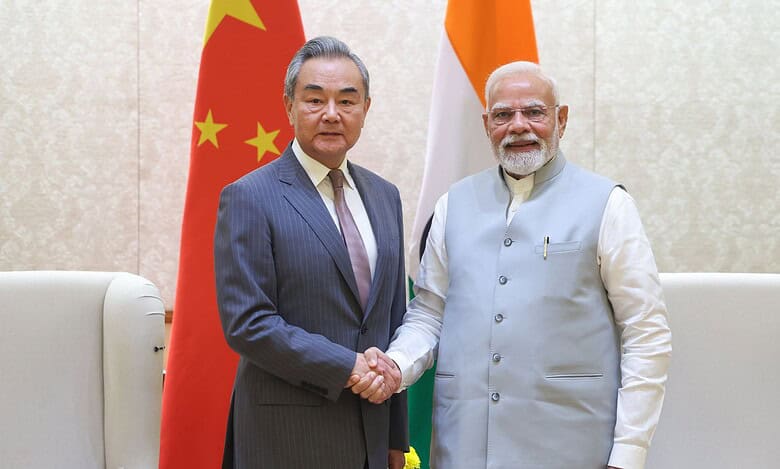 Prime Minister Narendra Modi with Chinese Foreign Minister Wang Yi during a meeting in New Delhi