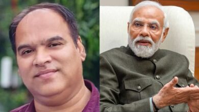 Cartoonist Hemant Malviya (left) and PM Modi