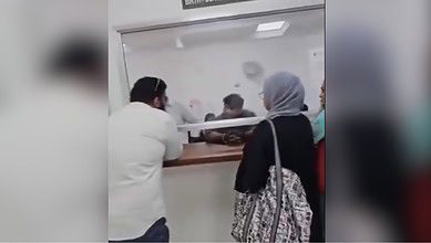 A bystander defends a Muslim woman after she was asked by the corporation official to converse in Marathi