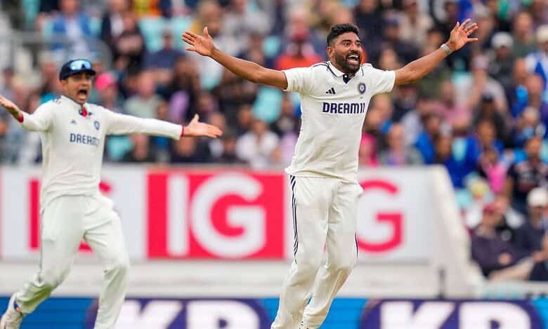 India's Mohammed Siraj and captain Shubman Gill celebrate the wicket of Englnd's Jamie Overton during the fifth day of the fifth Test match between India and England at The Oval cricket ground in London on Monday.