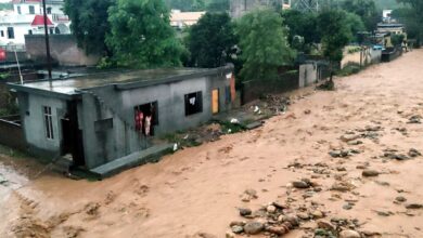 Debris and mud accumulated in a residential area following a cloudburst, in Kathua on Sunday (PTI)