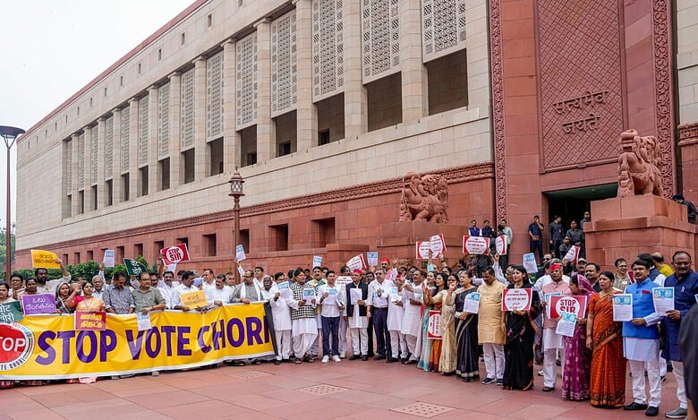 RJD MP Manoj Jha with other parliamentarians from the INDIA bloc parties at a protest against the Election Commission's Special Intensive Revision (SIR) of electoral rolls in Bihar during the Monsoon session of Parliament in New Delhi on Monday (PTI Photo/Ravi Choudhary)