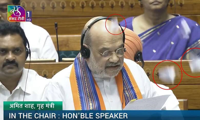 Opposition throws torn copies of the three contentious Bills on Union Home Minister Amit Shah in Lok Sabha on Wednesday