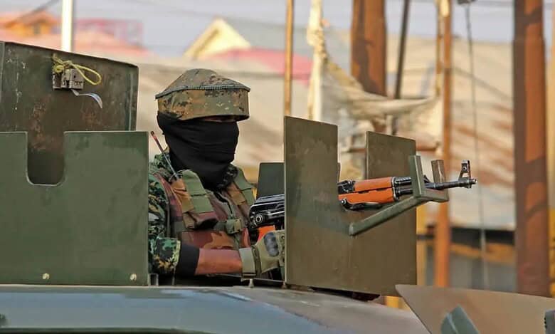An Indian Army soldier guards a checkpost in Jammu and Kashmir