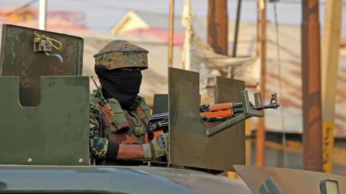 An Indian Army soldier guards a checkpost in Jammu and Kashmir