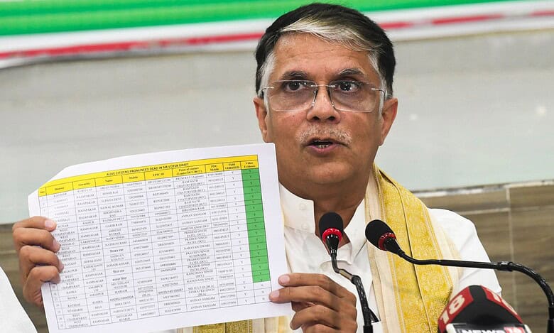 Congress leader Pawan Khera addresses a press conference in Patna on Sunday (PTI Photo)