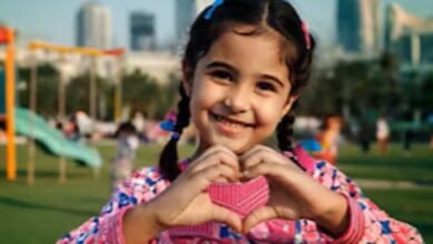 Digital Dubai’s AI-generated character 'The Girl' dressed in modern Emirati attire, representing the first virtual member of the Emirati Family.