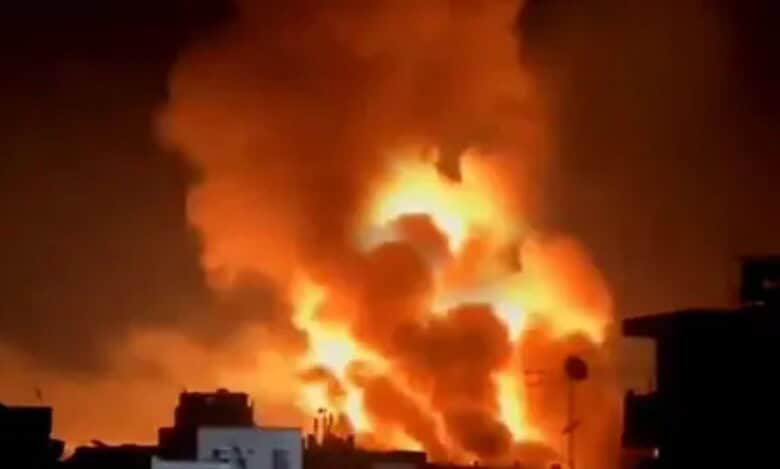 Flames and smoke rise during overnight bombing in Jabalia, northern Gaza.