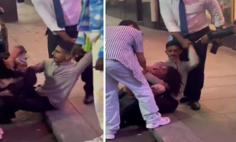 A Saudi man restrains a suspected phone thief on a London pavement as others gather around, in a viral street confrontation video.