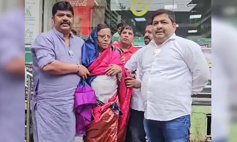 BJP workers force Congress leader to wear saree over morphed PM Modi post