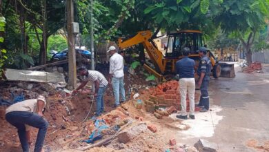 HYDRAA officials clear encroachments from parks in Hyderabad.