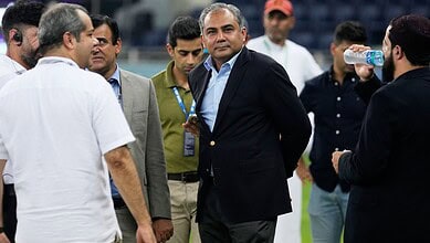 Pakistan's Minister of Interior Mohsin Naqvi, center, stands with officials on the field after India won the Asia Cup cricket final against Pakistan at Dubai International Cricket Stadium, United Arab Emirates, Sunday, Sept. 28, 2025. (AP /PTI)