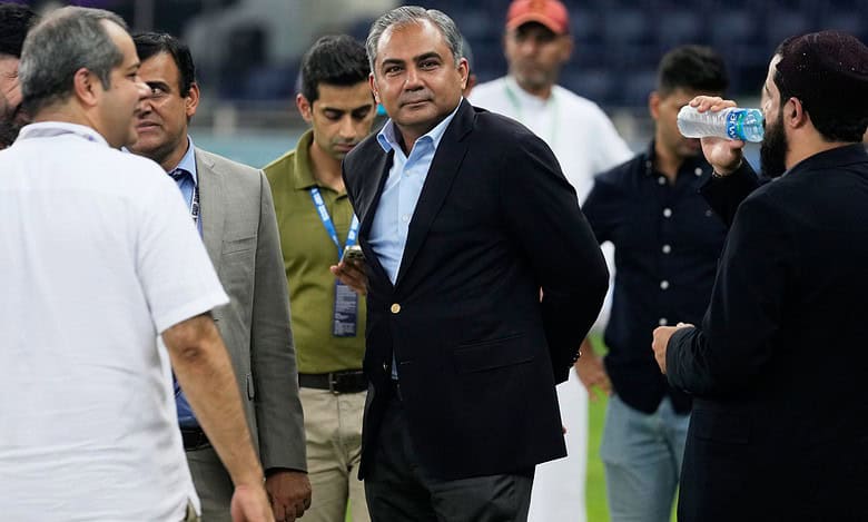 Pakistan's Minister of Interior Mohsin Naqvi, center, stands with officials on the field after India won the Asia Cup cricket final against Pakistan at Dubai International Cricket Stadium, United Arab Emirates, Sunday, Sept. 28, 2025. (AP /PTI)