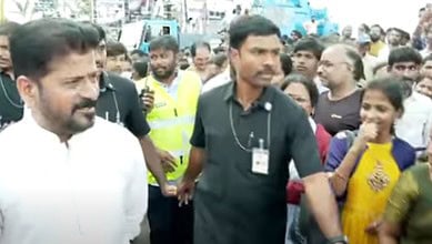 The image shows Telangana CM A Revanth Reddy supervising the Ganesh immersion process at Necklace Road on Saturday, September 6, 2025.