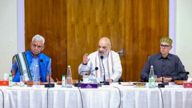 Union Home Minister Amit Shah, Jammu and Kashmir Lt. Governor Manoj Sinha and state CM Omar Abdullah during a meeting over the flood situation at Raj Bhawan in Jammu on Monday (PTI Photo)