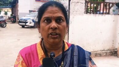 A woman addresses the media after her family was attacked in Attapur