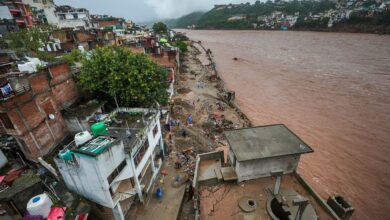 The Gujjarnagar area of Jammu's Tawi River which continues to flow amid rainfall. (PTI Photo)