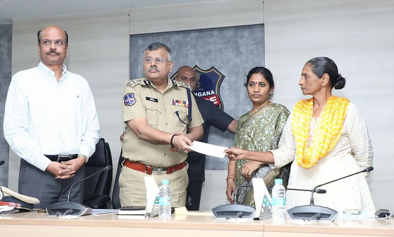 Senior Maoist leader Potula Padmavathi surrenders before DGP Dr Jitender on Saturday