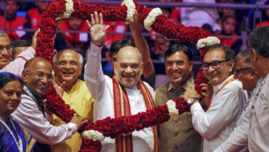 Union Home Minister Amit Shah, Union Sports Minister Mansukh Mandaviya, Gujarat Chief Minister Bhupendra Patel and others during the inauguration of Veer Savarkar Sports Complex in Gujarat on Sunday (PTI)