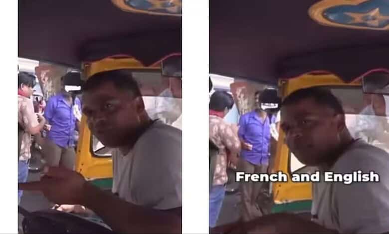 An auto driver in India speaks fluent English and French