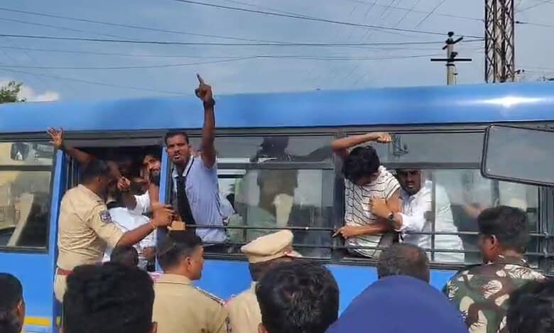 Muslim young men in protest against the demolition of a dargah and graveyard in Kodangal