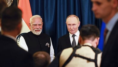 Indian Prime Minister Narendra Modi (left) and Russian President Vladimir Putin pose during their meeting on the sidelines of the Shanghai Cooperation Organization (SCO) summit in Tianjin, China on Monday. (AP/PTI)