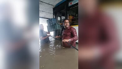 Police rescue passengers stuck in floodwater in Warangal