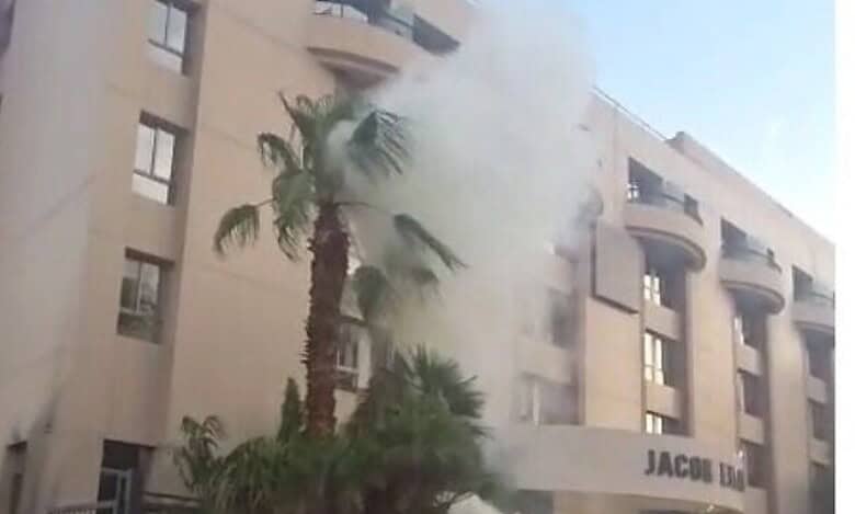 Smoke rises from a building following a suspected drone attack in Eilat, Israel, on September 18, 2025.