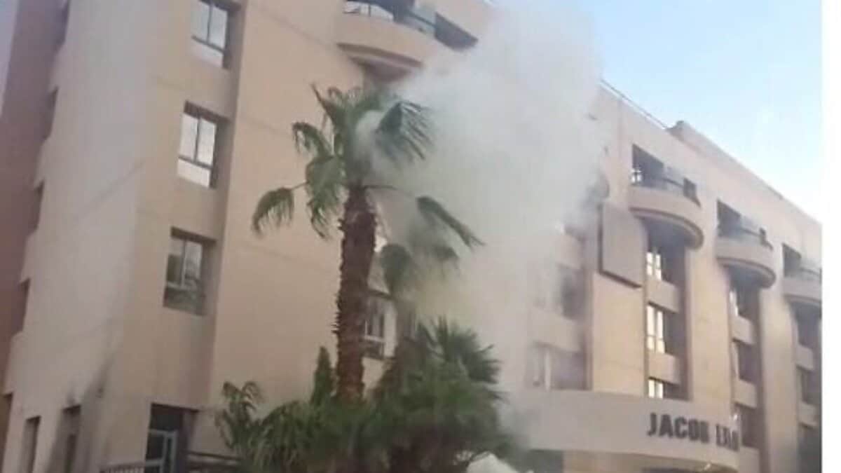 Smoke rises from a building following a suspected drone attack in Eilat, Israel, on September 18, 2025.