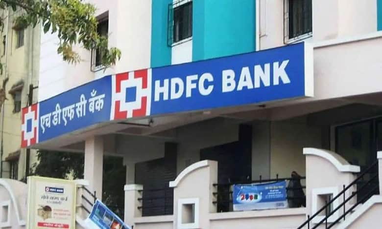 Exterior view of an HDFC Bank branch in India with bilingual signage in English and Hindi.