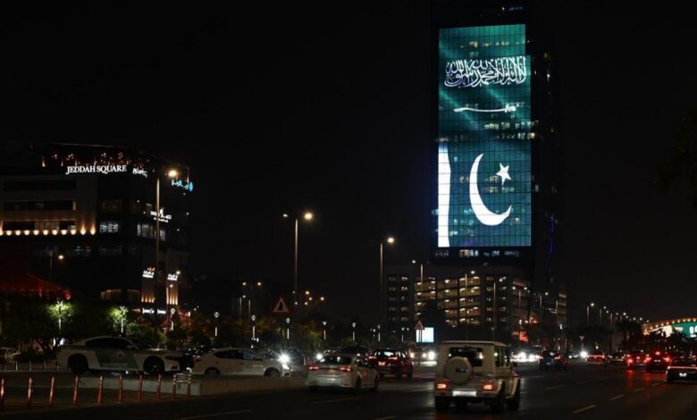 Illuminated tower featuring Saudi and Pakistan flags in celebration of the defence agreement.