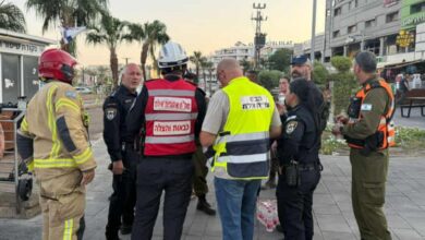 Israeli soldiers and emergency responders gather at the site of a drone attack in the southern resort city of Eilat, after a strike launched from Yemen.