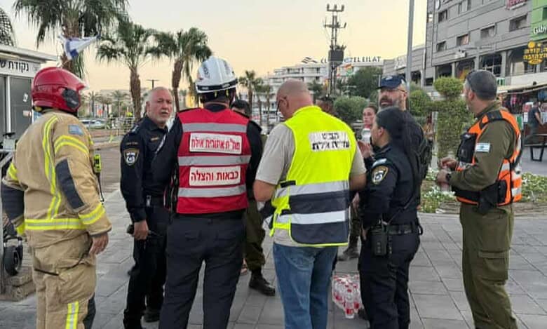 Israeli soldiers and emergency responders gather at the site of a drone attack in the southern resort city of Eilat, after a strike launched from Yemen.