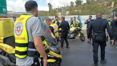 Paramedics and police at the scene of a shooting attack in Jerusalem.