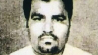 Mugshot of Munawar Khan, deported from Kuwait in a bank fraud case.