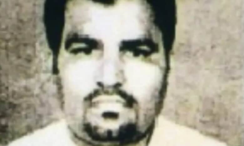 Mugshot of Munawar Khan, deported from Kuwait in a bank fraud case.