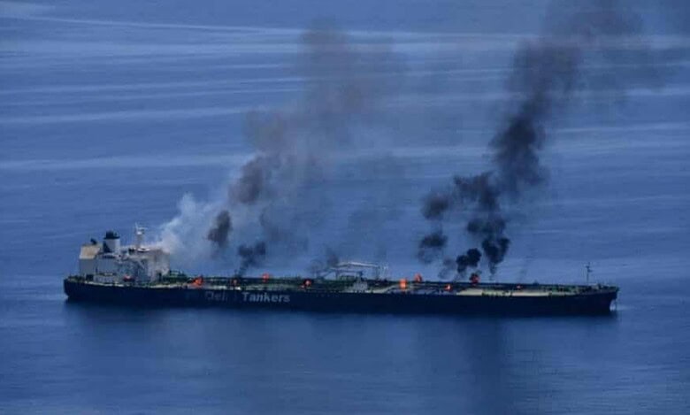 Oil tanker in the Red Sea with multiple fires and black smoke rising from the deck after an attack.