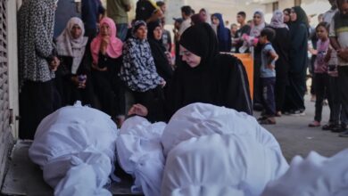 Palestinians mourn during a funeral for victims killed in an Israeli airstrike in Gaza.
