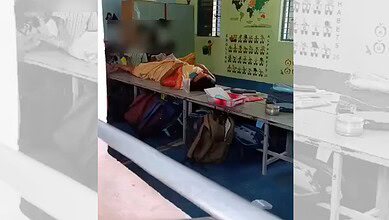 Primary school children massage their principal's legs in Tamil Nadu's Dharmapuri district