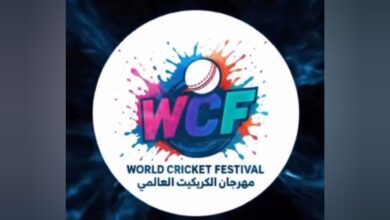 A circular logo for the World Cricket Festival featuring a cricket ball and colourful splashes, with text in English and Arabic.