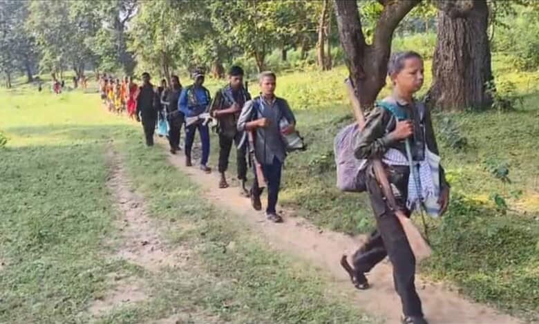 The image shows around 140 Maoists on their way to surrender before Chhattisgarh chief minister Vishnu Deo Sai on Friday, October 17, 2025.