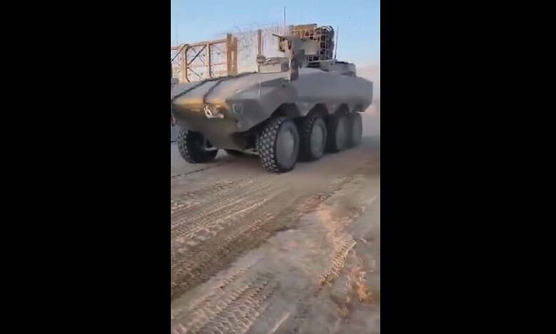 An Israeli military tank leaves Gaza