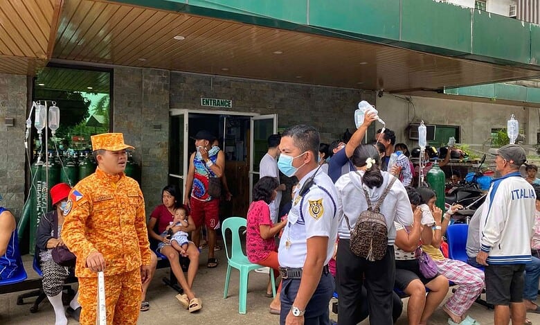 In this photo provided by the Bureau of Fire Protection, patients, who were already there when a quake happened, stay outside a hospital following a strong earthquake in Bansalan, Davao del Sur, southern Philippines on Friday Oct. 10, 2025. AP/PTI