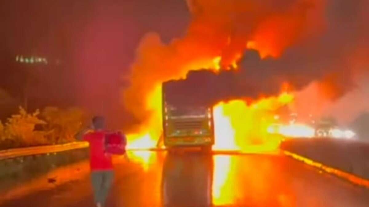 The image shows a private bus carrying 40 passengers from Hyderabad to Bengaluru going up in flames after hitting a bike in Kurnool mandal of Andhra Pradesh on Friday, October 24, 2025.