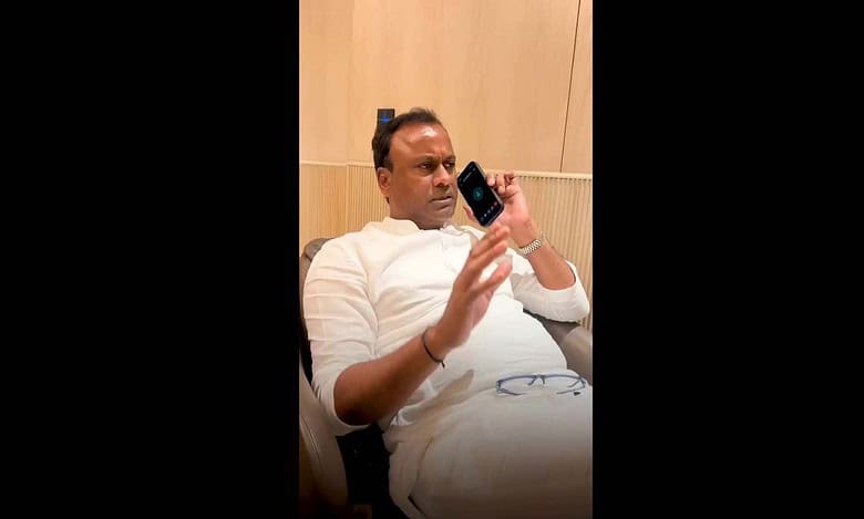 Komatireddy Rajgopal Reddy speaks to officials on the phone