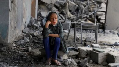 A Palestinian girl sits amid debris at a United Nations school where displaced people were taking shelter, after it was bombed by Israel in the Zeitoun neighbourhood in Gaza City, on October 1, 2025 Ebrahim Hajjaj/Reuters]