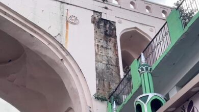 A piece of lime plaster, in Charminar, collapsed on a local gravely injuring him